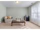 Cozy living room with comfortable sofa, coffee table, and lots of natural light at 3920 Vine Gate Dr, Lithonia, GA 30038
