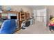 Home office with built in storage, computer, and natural light from the window at 3920 Vine Gate Dr, Lithonia, GA 30038