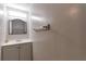 Clean bathroom featuring single sink vanity and modern lighting at 922 Lakewood Ln, Jonesboro, GA 30238