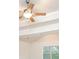 Bedroom featuring a ceiling fan and a large window at 211 Lotus Ln, Covington, GA 30016