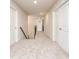 Upstairs hallway with carpet and two doors at 211 Lotus Ln, Covington, GA 30016