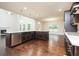 Gourmet kitchen with stainless appliances, granite countertops, and a large island at 211 Lotus Ln, Covington, GA 30016