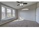 Bedroom featuring a bay window and arched window for ample natural light at 58 Knox Rd, Powder Springs, GA 30127