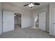Neutral bedroom with multiple doors leading to other rooms at 58 Knox Rd, Powder Springs, GA 30127