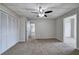 Neutral bedroom with carpet, a ceiling fan, and a closet at 58 Knox Rd, Powder Springs, GA 30127
