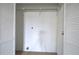 Empty closet with shelving and white wood doors at 58 Knox Rd, Powder Springs, GA 30127