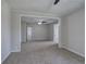 Living room featuring neutral tones, multiple access points, and carpet flooring at 58 Knox Rd, Powder Springs, GA 30127