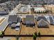 Aerial shot of the property, fenced backyard and amenities center including pool, common area, parking at 6180 Bellmoore Park Ln, Duluth, GA 30097