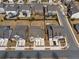 Aerial view of home in quiet neighborhood setting, showcasing proximity to parks, sidewalks, and community at 6180 Bellmoore Park Ln, Duluth, GA 30097