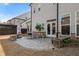 Backyard featuring extended patio and bench seating at 6180 Bellmoore Park Ln, Duluth, GA 30097