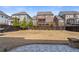 Large backyard, with privacy fence, stone patio, and mature landscaping at 6180 Bellmoore Park Ln, Duluth, GA 30097
