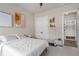 Cozy bedroom with a comfortable bed, closet, and stylish decor, providing a relaxing and inviting atmosphere at 6180 Bellmoore Park Ln, Duluth, GA 30097
