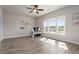 Bright bedroom featuring hardwood floors, natural light and ceiling fan at 6180 Bellmoore Park Ln, Duluth, GA 30097