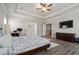 This main bedroom boasts tray ceilings, wood-look flooring, neutral walls and easy access to the bathroom and stairs at 6180 Bellmoore Park Ln, Duluth, GA 30097