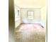 Spacious living room with natural light coming through the windows at 2075 Dellwood Pl, Decatur, GA 30032