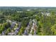 An aerial view of homes nestled among lush green trees and landscaping at 3644 Gray Birch Dr, Decatur, GA 30034