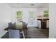 Cozy dining area with modern decor, beautiful backyard views, and neutral colors at 3644 Gray Birch Dr, Decatur, GA 30034