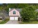 Charming two-story home with a two-car garage and a well-manicured front yard at 3644 Gray Birch Dr, Decatur, GA 30034