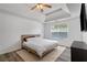 Relaxing main bedroom with a tray ceiling, natural light, and neutral colors at 3644 Gray Birch Dr, Decatur, GA 30034