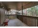 Inviting balcony features a cozy bench, offering a peaceful outdoor space to enjoy the surrounding views at 1804 Cumberland Se Ct, Smyrna, GA 30080