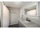 Modern bathroom features a marble vanity with a sleek faucet, complemented by a shower and updated fixtures at 1804 Cumberland Se Ct, Smyrna, GA 30080