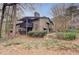 Two-story condo featuring private balconies, natural landscaping, and neutral color palette at 1804 Cumberland Se Ct, Smyrna, GA 30080