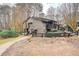Two-story condo featuring private balconies, natural landscaping, and neutral color palette at 1804 Cumberland Se Ct, Smyrna, GA 30080