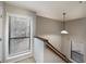 Well-lit stairwell with natural light and modern railing, ensuring a bright transition between floors at 1804 Cumberland Se Ct, Smyrna, GA 30080