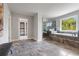 This bathroom offers a tiled floor, a soaking tub and a separate glass enclosed shower at 3118 Old Covington Hwy, Covington, GA 30014