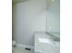Bathroom featuring a granite countertop, white sink, neutral walls, and minimalist design at 3118 Old Covington Hwy, Covington, GA 30014
