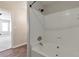 Bright bathroom with white tiled shower and soaking tub at 600 Canterbury Ln, Lawrenceville, GA 30046