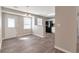 Bright dining area featuring wood floors, modern lighting, and easy access to the kitchen at 600 Canterbury Ln, Lawrenceville, GA 30046