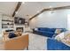 Inviting living room with wooden beams, cozy furniture, fireplace and stylish decor at 2418 Claude Brewer Rd, Loganville, GA 30052