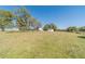 Generous lawn surrounding a home and outbuilding, providing plenty of space and natural beauty at 2418 Claude Brewer Rd, Loganville, GA 30052