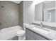 Updated bathroom features tile surround, modern vanity, and great natural light at 2784 Hilson Commons, Decatur, GA 30034