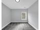Cozy bedroom featuring plush carpet and natural light from a window at 2784 Hilson Commons, Decatur, GA 30034