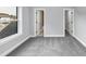 Cozy bedroom featuring plush carpet, neutral walls, and a view of the neighborhood at 2784 Hilson Commons, Decatur, GA 30034