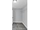 This closet features neutral gray walls, carpet flooring and a wire rack shelf for optimal storage space at 2784 Hilson Commons, Decatur, GA 30034