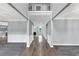 Spacious foyer showcasing an open floor plan, hardwood flooring, and a glimpse of the living area at 2784 Hilson Commons, Decatur, GA 30034