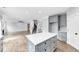Modern kitchen with gray cabinets, stainless appliances, and a spacious island at 2784 Hilson Commons, Decatur, GA 30034