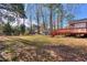 Spacious backyard with a wooden deck, offering plenty of room for recreation and outdoor activities at 4185 Duesenberg Dr, Tucker, GA 30084