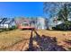 Expansive backyard features a wooden deck, providing ample space for outdoor gatherings and relaxation at 4185 Duesenberg Dr, Tucker, GA 30084