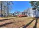 A beautiful backyard with a spacious deck, perfect for entertaining and enjoying the outdoors at 4185 Duesenberg Dr, Tucker, GA 30084