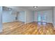 Finished basement features hardwood floors, with access to the outside at 4185 Duesenberg Dr, Tucker, GA 30084