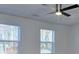 Bedroom featuring ceiling fan, natural light and a view of the yard at 4185 Duesenberg Dr, Tucker, GA 30084
