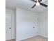Clean and well-lit bedroom features carpeting and closet at 4185 Duesenberg Dr, Tucker, GA 30084