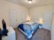 Carpeted bedroom features a queen bed and two closets at 501 Crescent Woode Dr, Dallas, GA 30157
