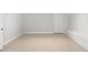 Finished basement featuring tiled floors and a bright, open layout with white trim at 156 Page Pl, Canton, GA 30114