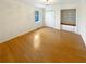 Bedroom with hardwood floors, closet, and a storage nook at 156 Page Pl, Canton, GA 30114