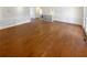 Spacious living room features beautiful hardwood floors and classic wall trim detail at 156 Page Pl, Canton, GA 30114